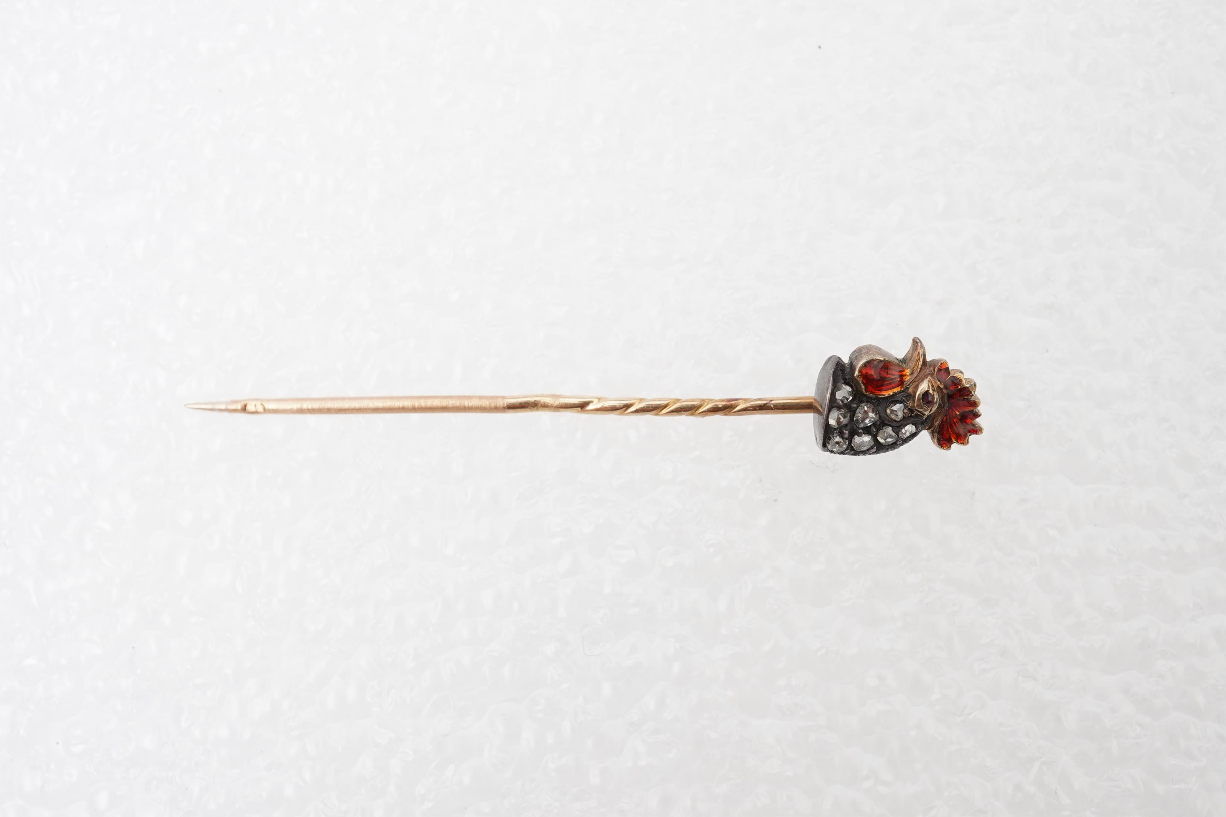 An enamel and diamond stick pin, circa 1900
